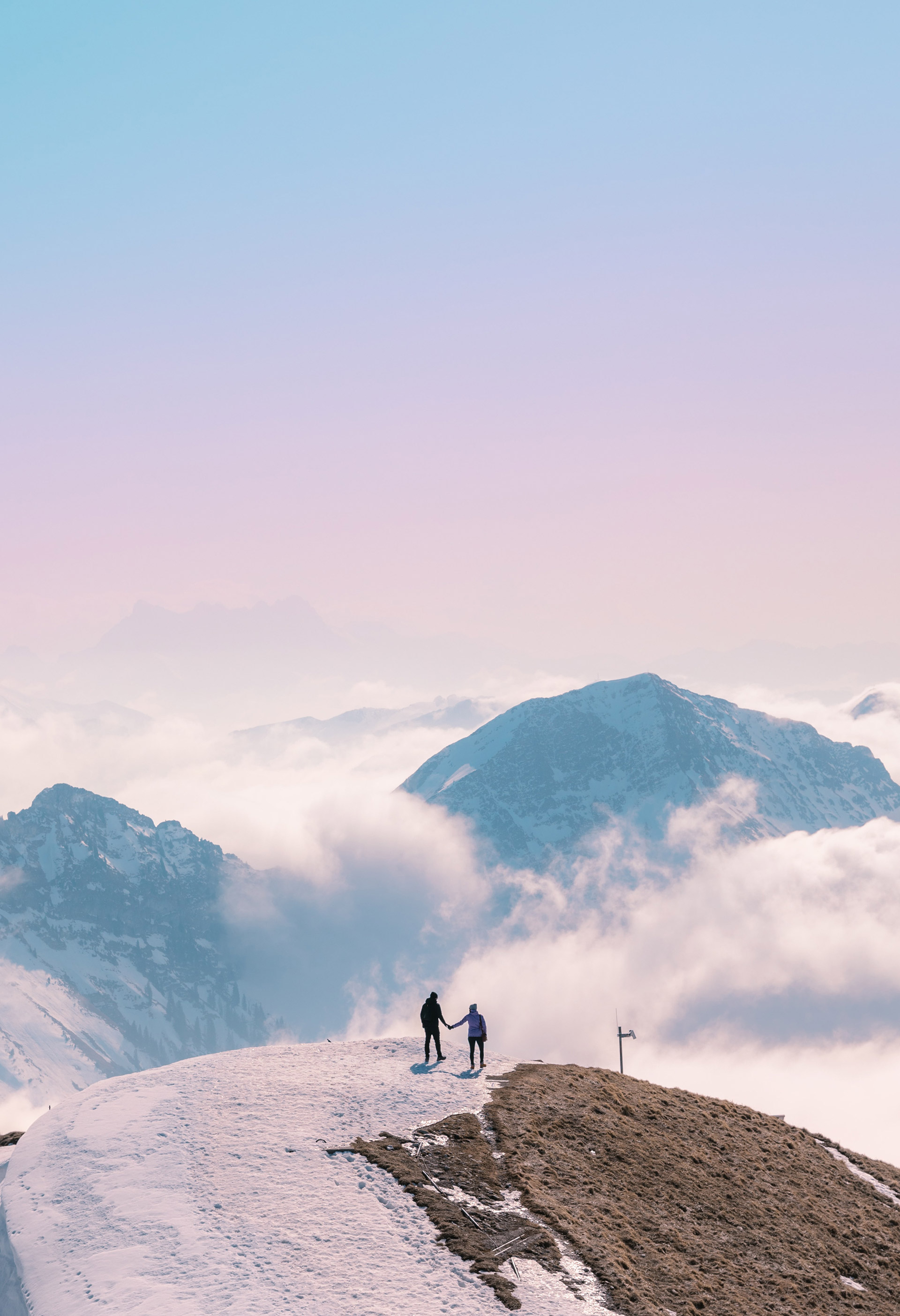 couple on mountain peak